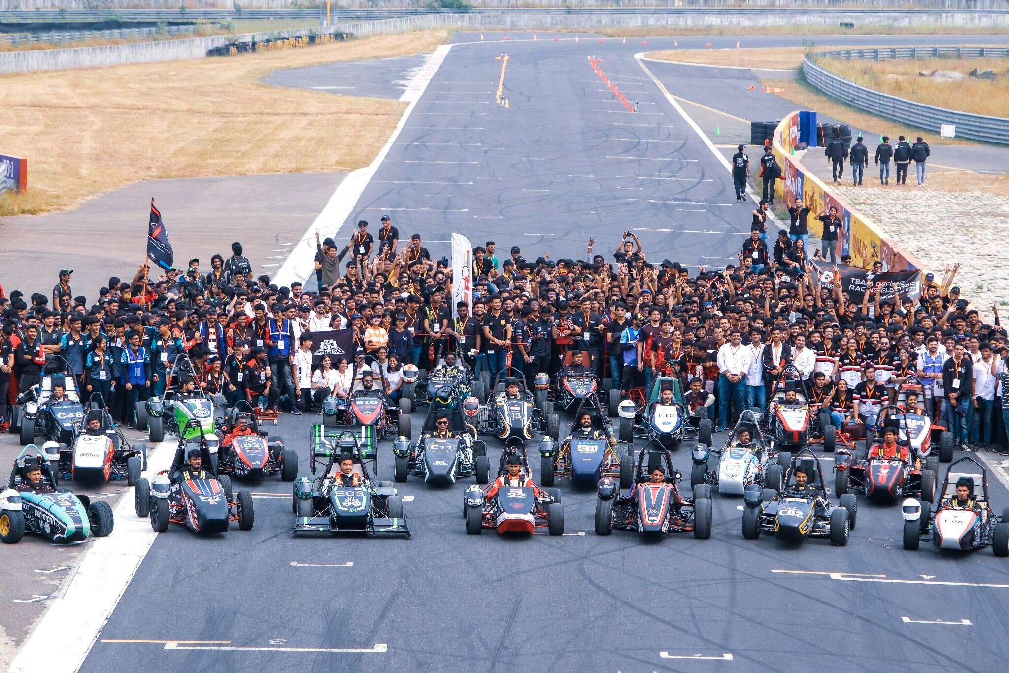 Formula Student teams and cars gathered at the competition track